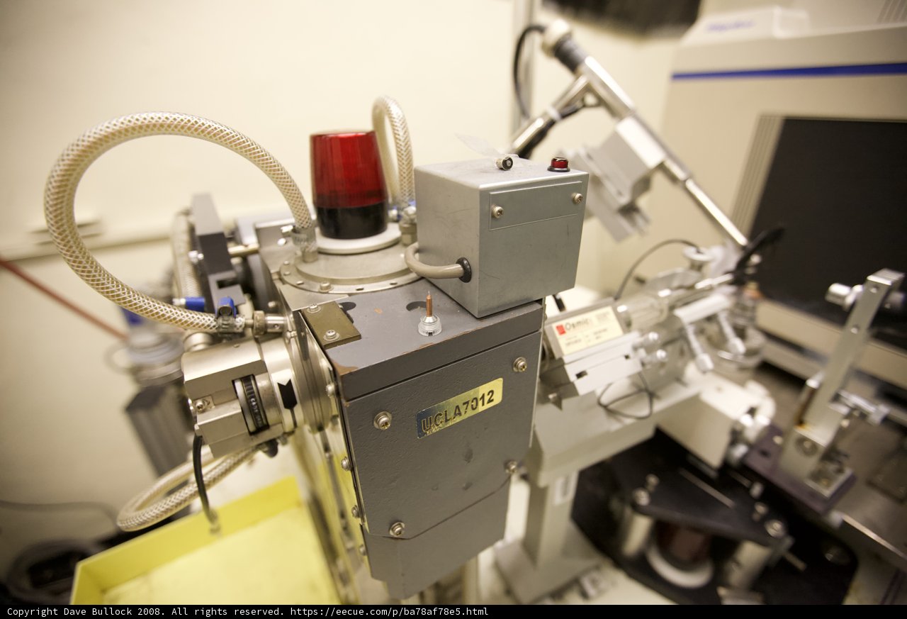 The Red-Lit Machine in the Biotech Lab