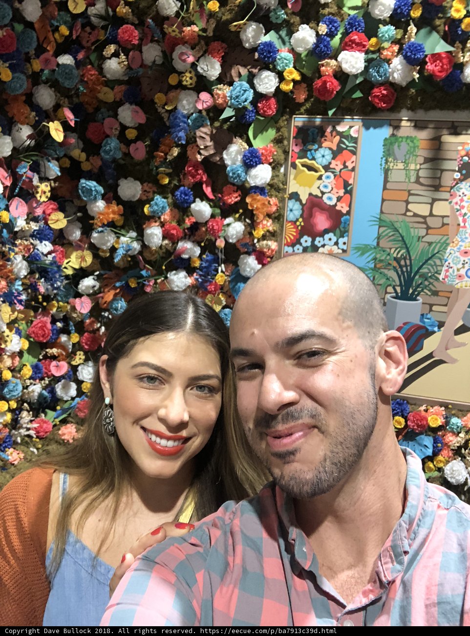 Selfie Time in Front of a Flower Wall