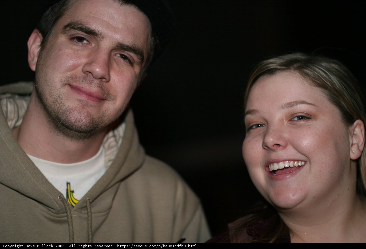 Smiling Couple in Cozy Hoodies