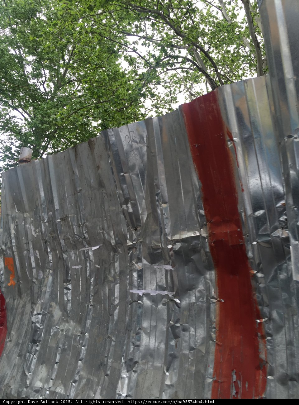 Silver and Red Metal Barrier