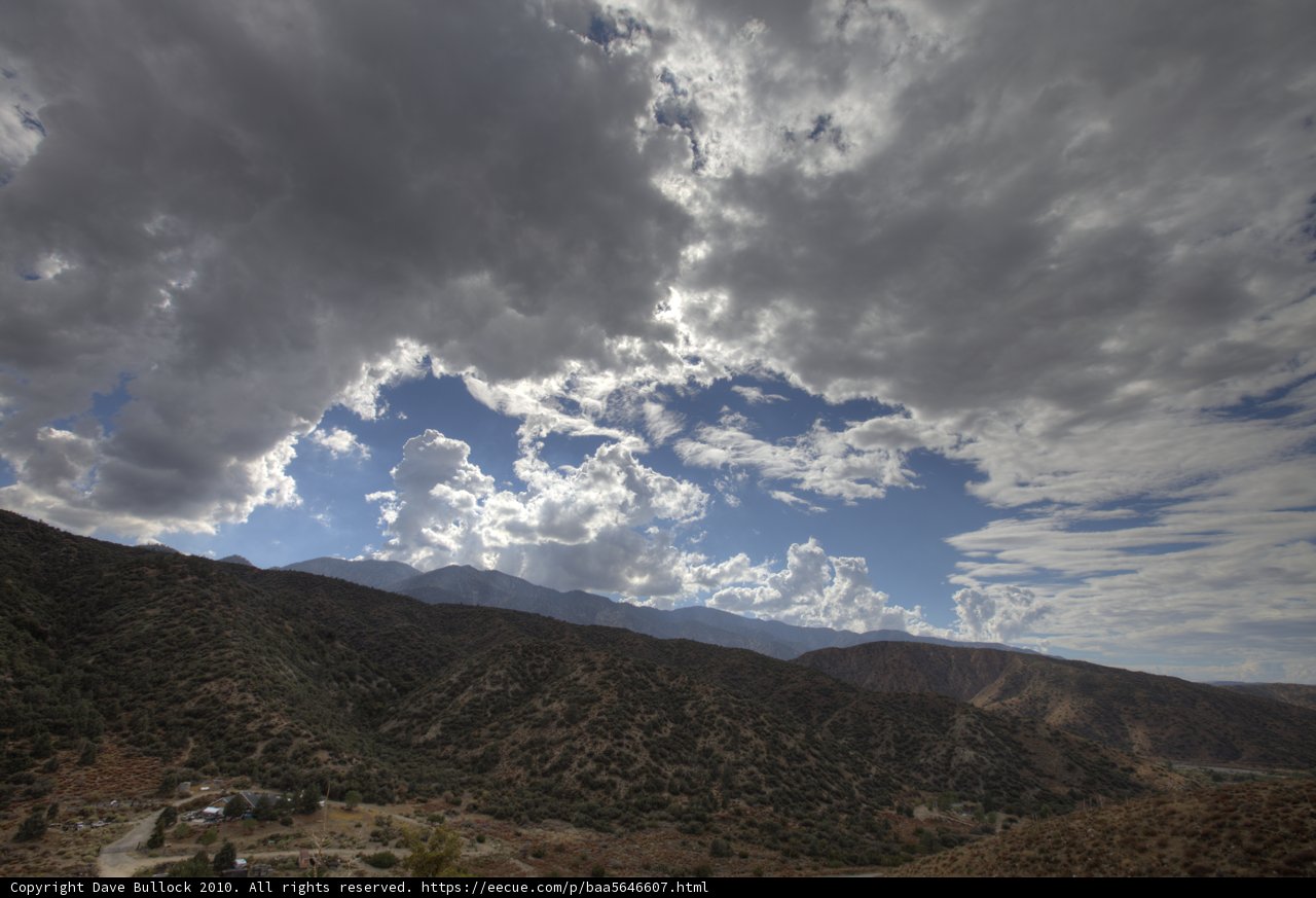 The Majestic Mountains under the Cumulus Clouds