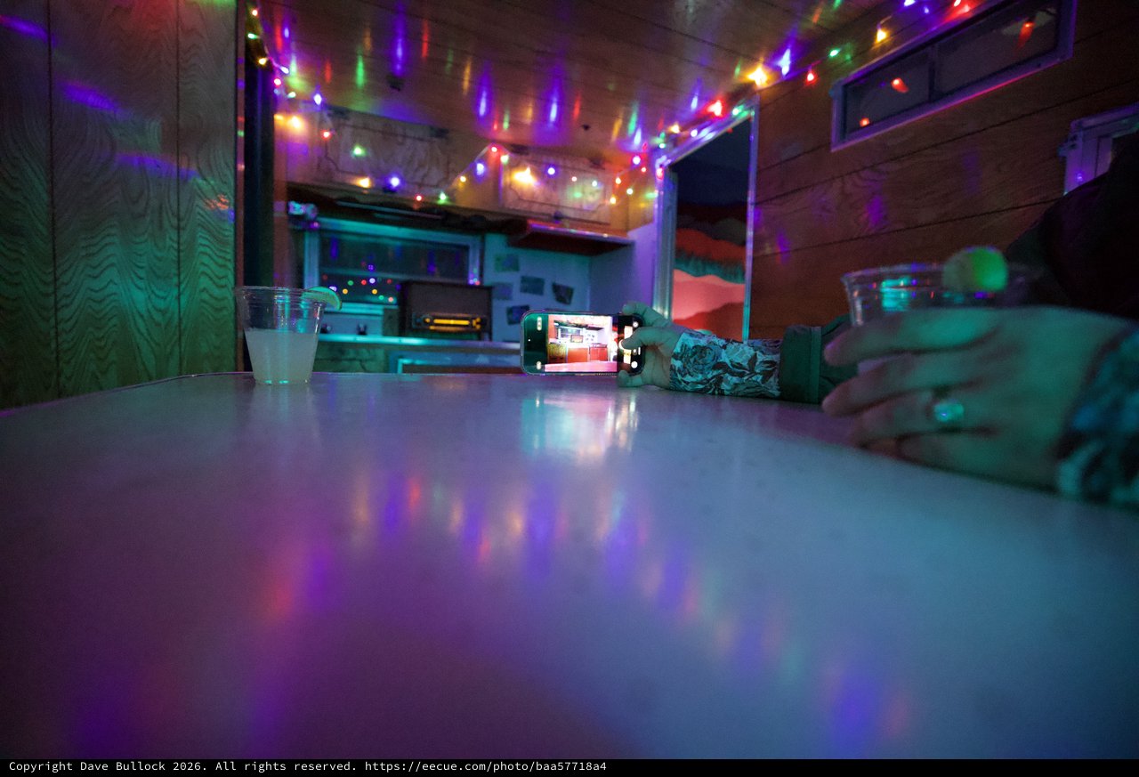 Intimate Evening at Colorful String-Lit Bar Counter