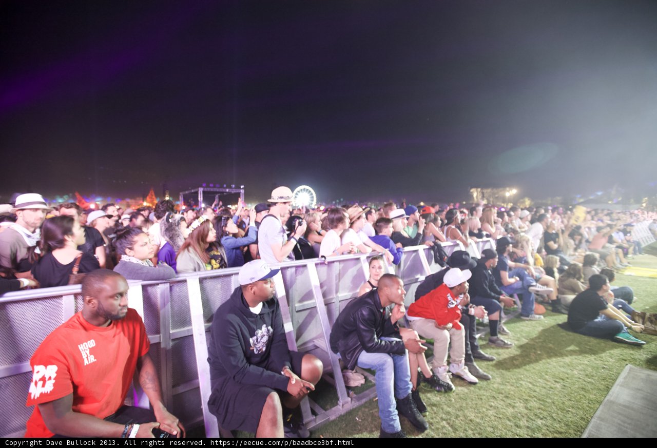 Crowd enjoying the music under the night sky
