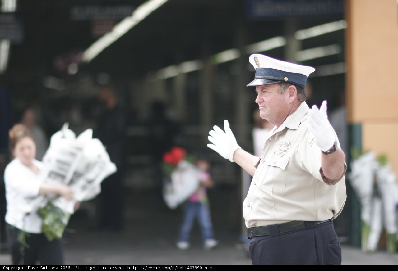 Police Officer with Flower Bouquet