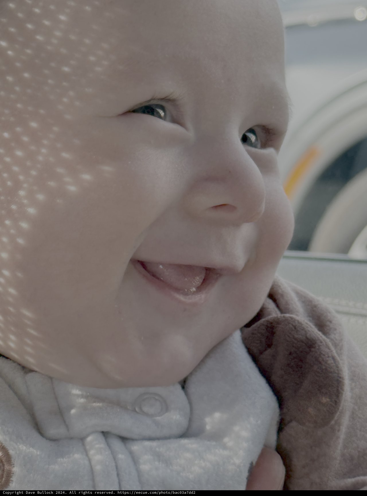 Joyful Baby's Bright Smile and Sparkling Eyes