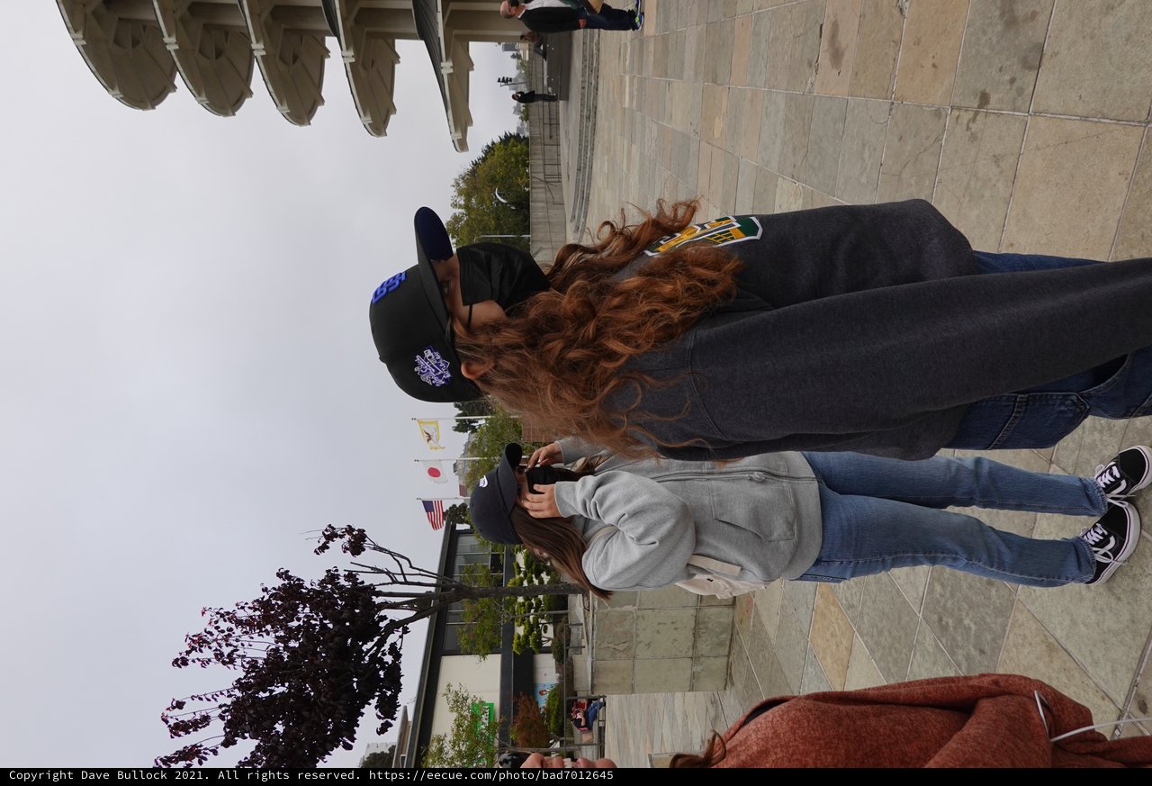 Masked Friends Taking Photos at Japanese Peace Plaza