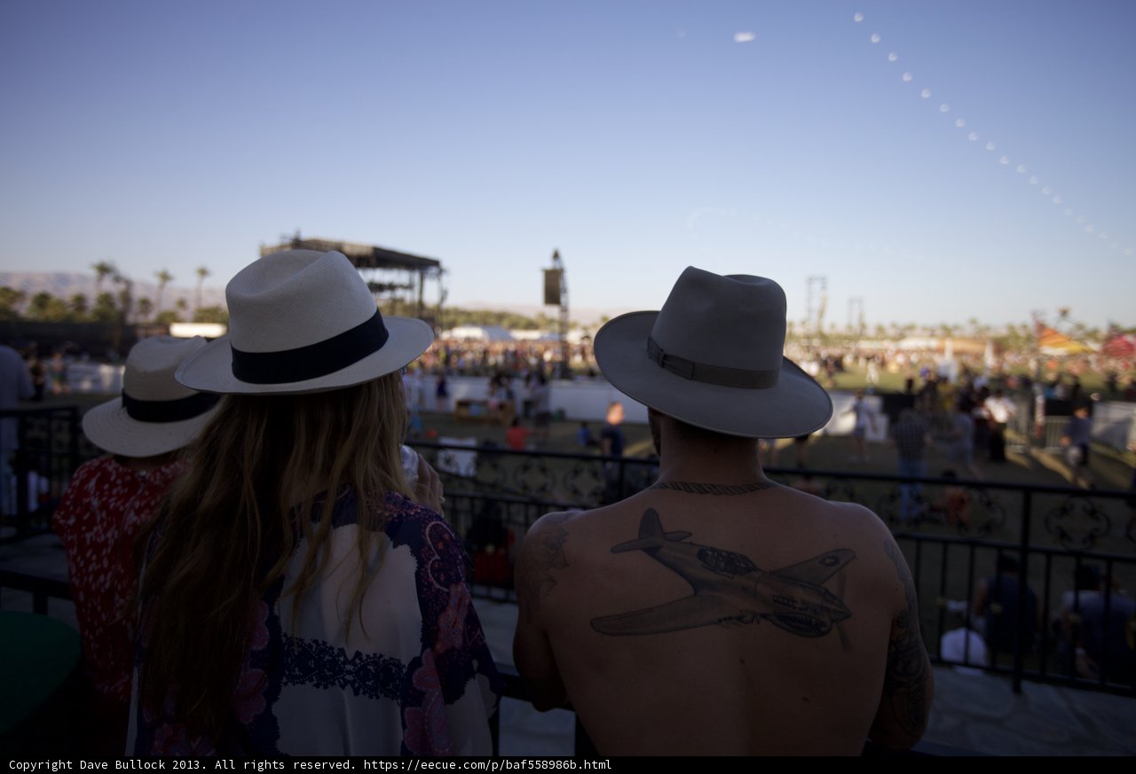 Tattooed and Hat-clad Music Lovers