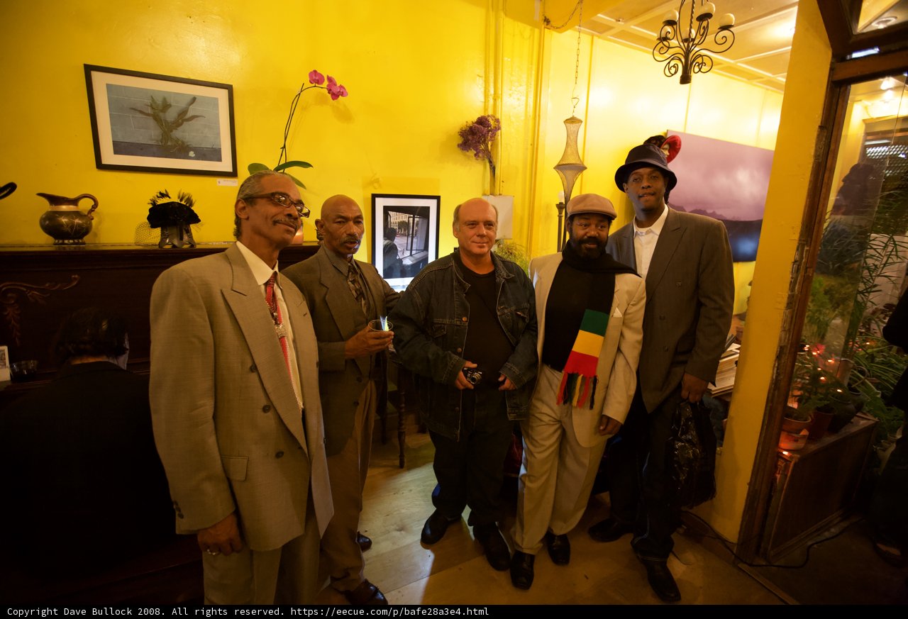 Formal Gathering in front of Yellow Wall