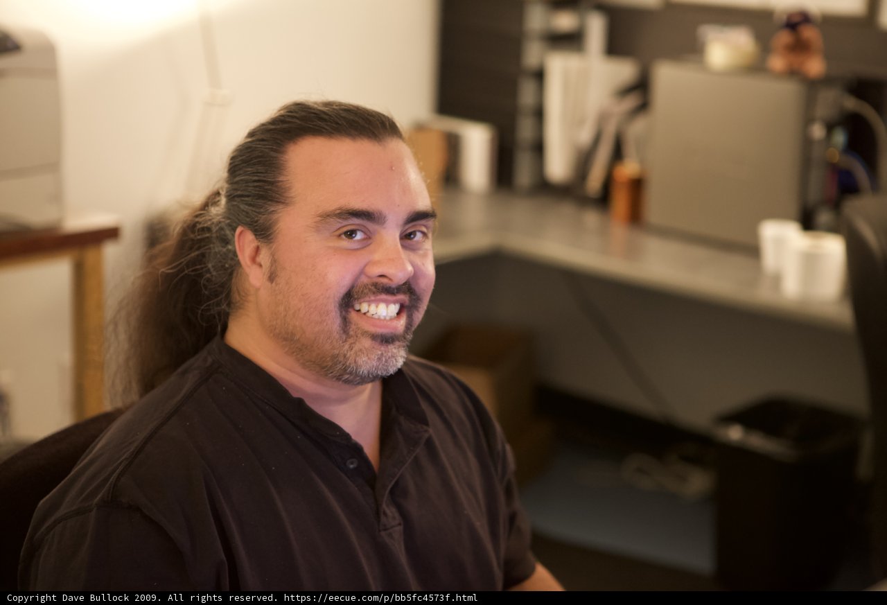 Long-Haired Man's Joyful Smile