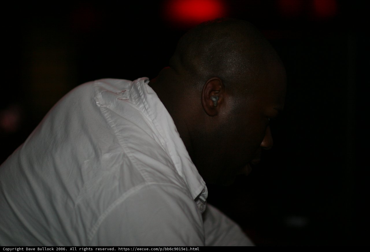 The Contemplative Man in the White Dress Shirt