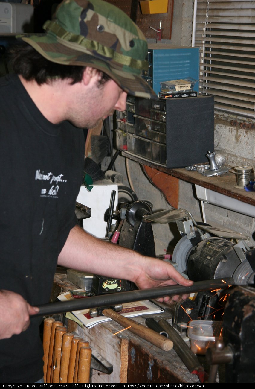 The Hat Wearing Factory Worker