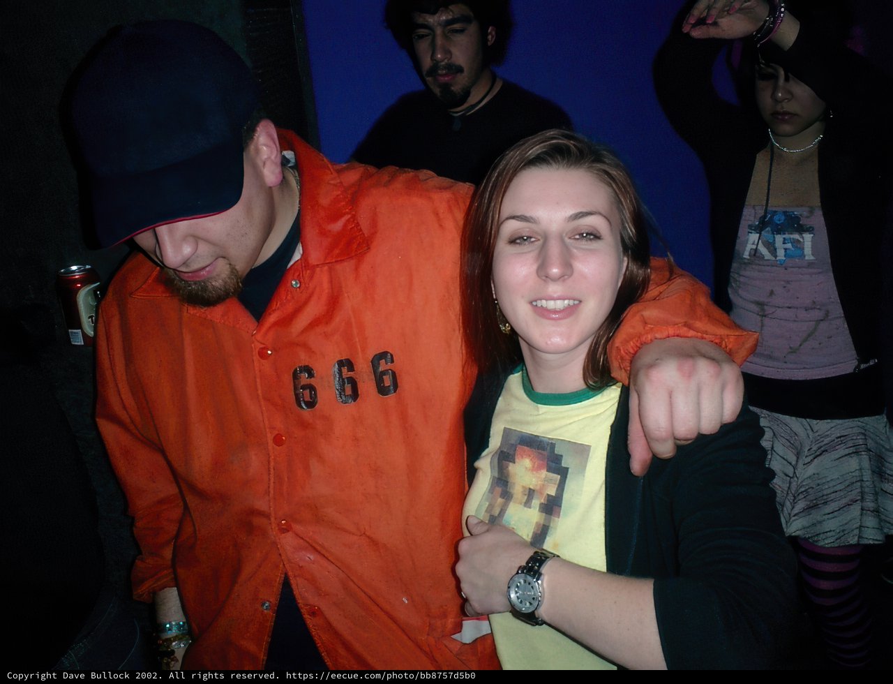 Urban Couple Wearing Jackets and Baseball Caps