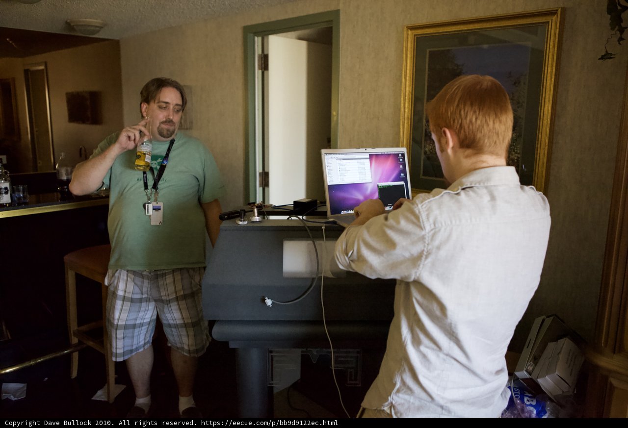 Two Men Working on Laptop