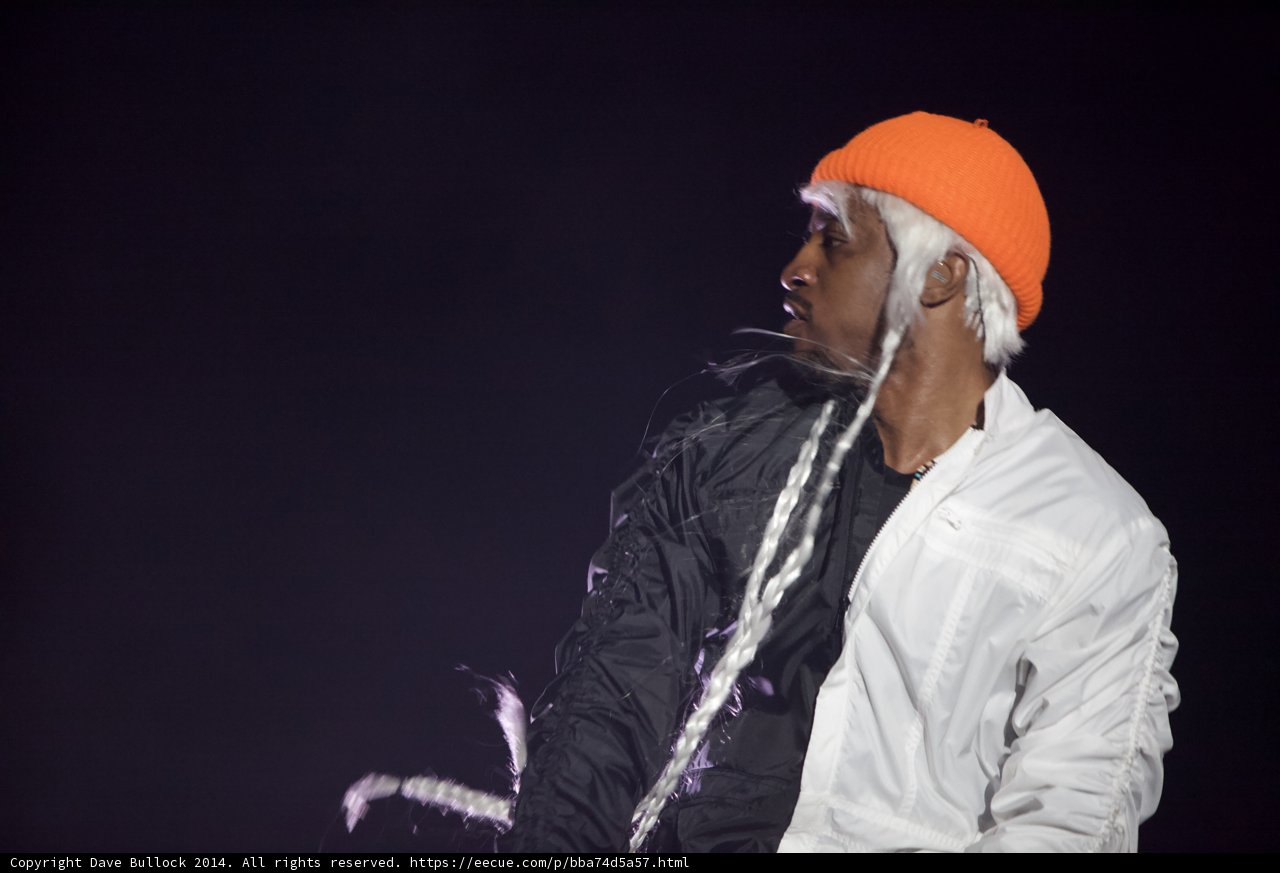 Orange Hat and Dreadlocks