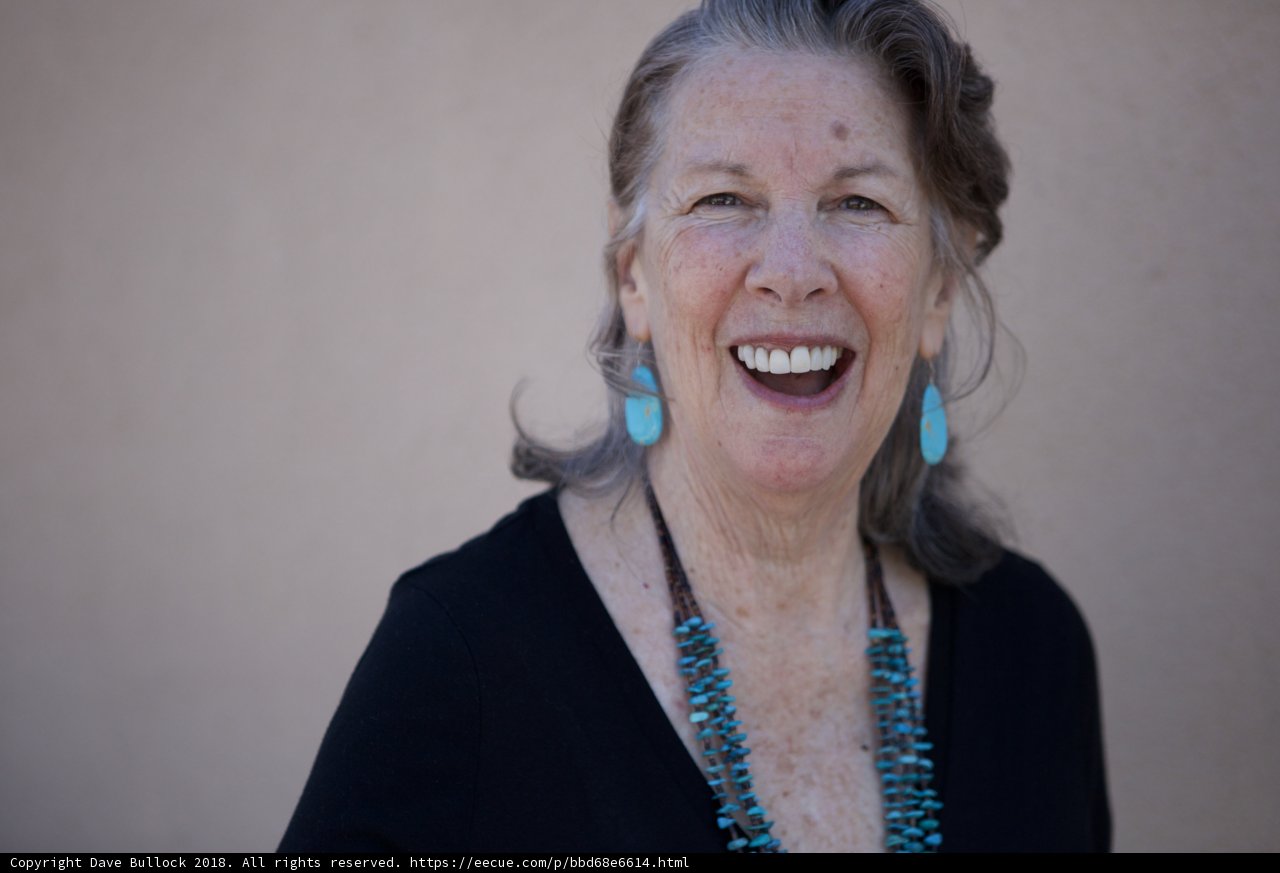 Blue Earrings and Black Shirt