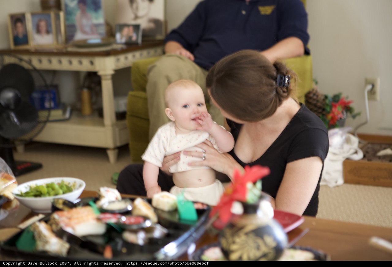 Mother and Baby Share a Tender Holiday Moment