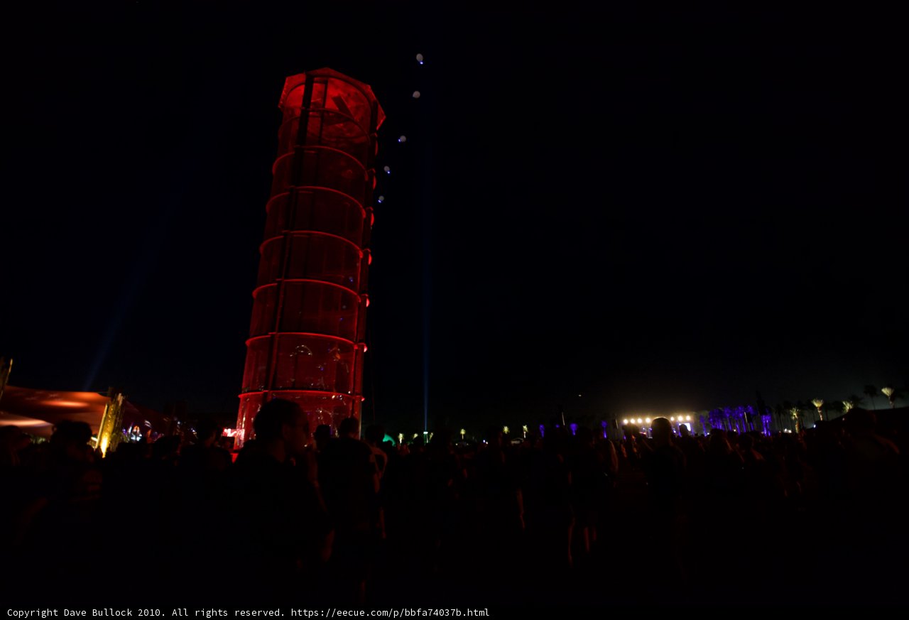 Red-Lit Tower Amongst Urban Light