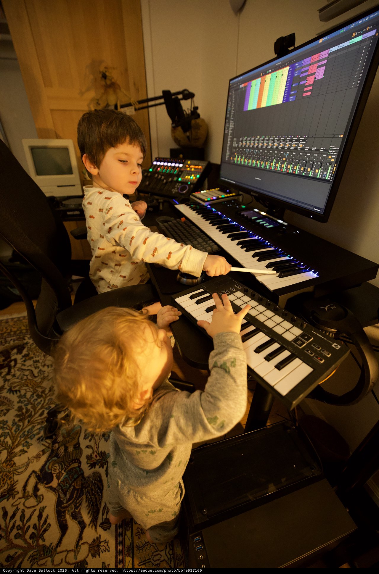 Young Brothers Creating Music in Home Recording Studio