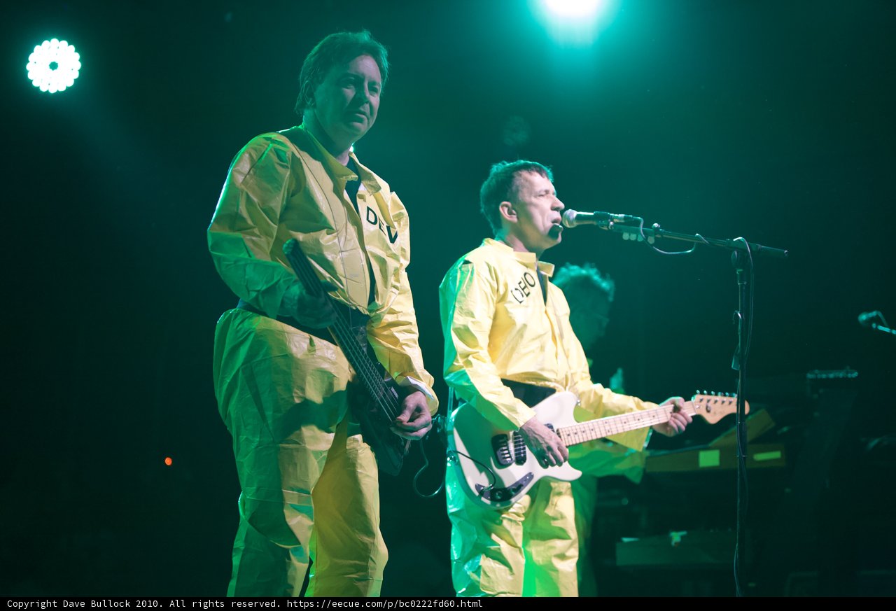 Yellow-Suited Men Rocking the Stage