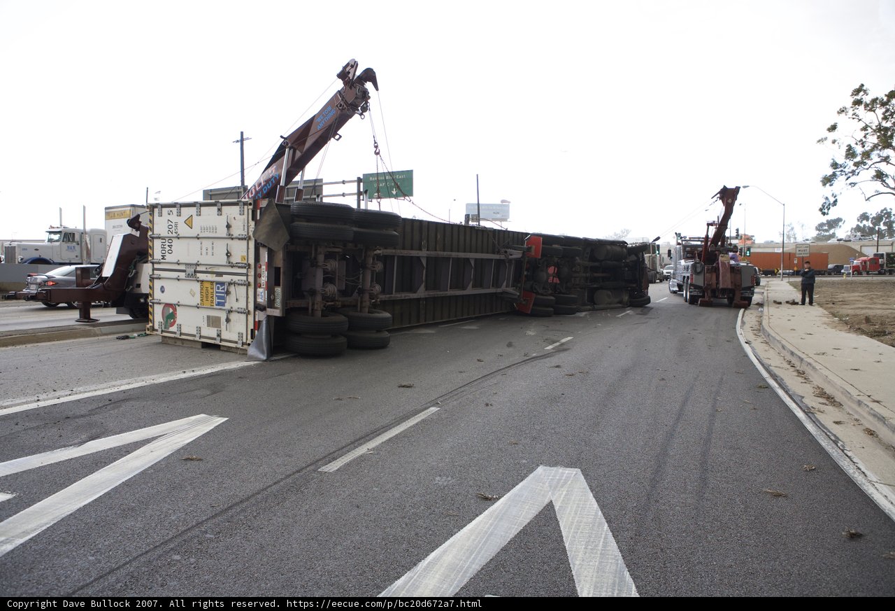 Overturned Truck Being Lifted Off the Road