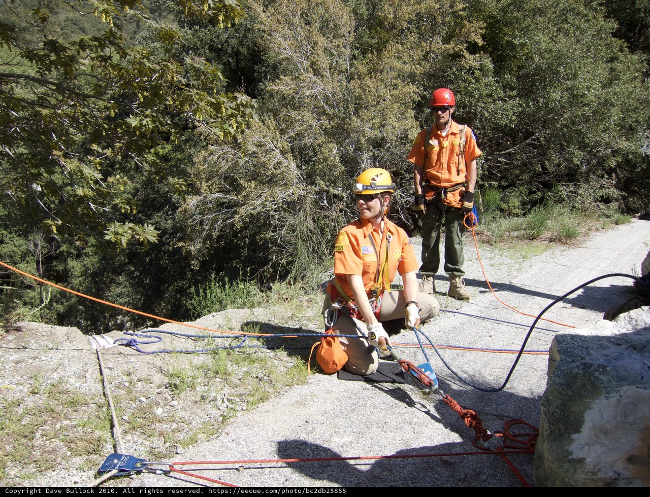 Search and Rescue Team Rappelling Training on Rocky Cliff