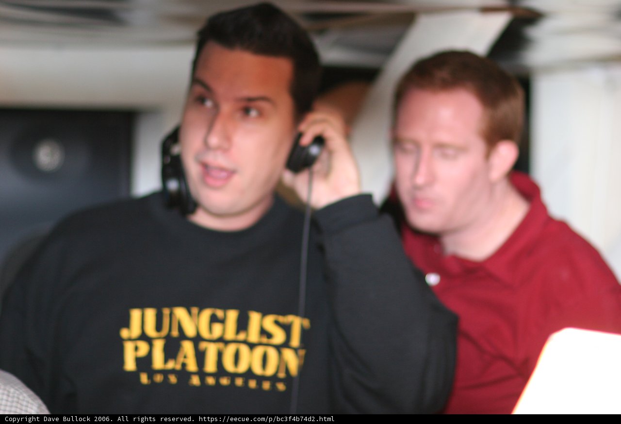 Black-Shirted Man with Microphone and Headphones