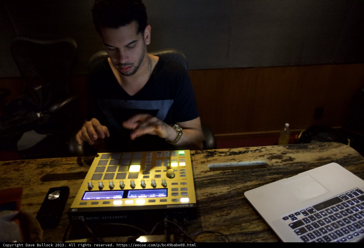 Man Using Laptop and Controller