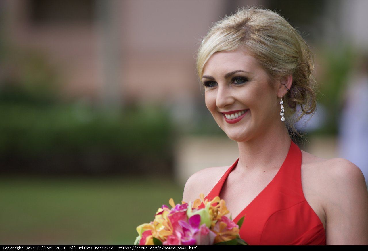 The Lady in Red with a Bouquet of Blooms