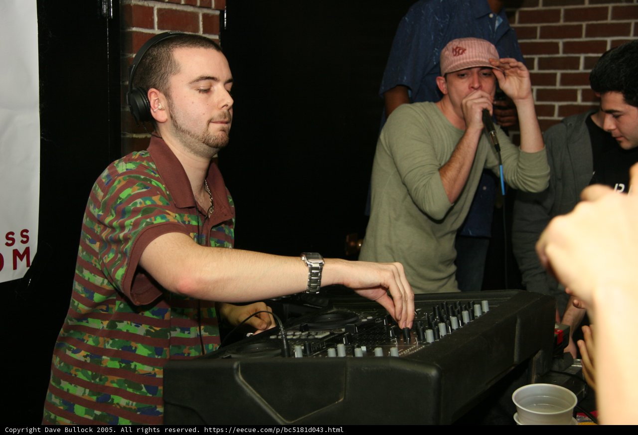 Green Shirted DJ Rocks the Turntable