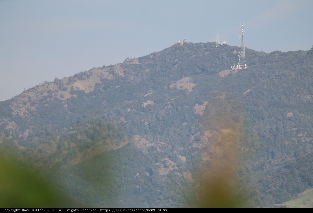Radio Towers on Distant Mountain Ridge at Dawn