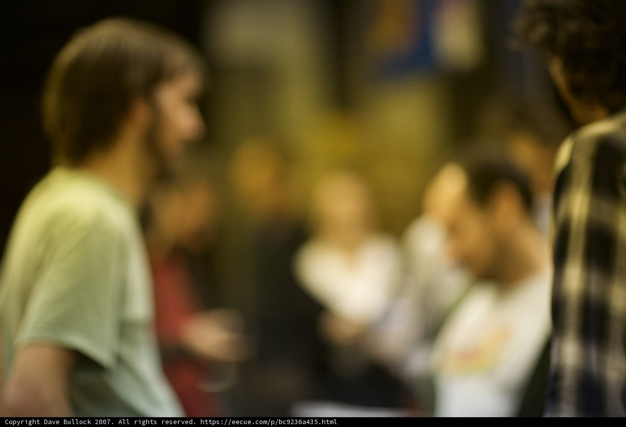 Blurred Crowd in a Garnet Room