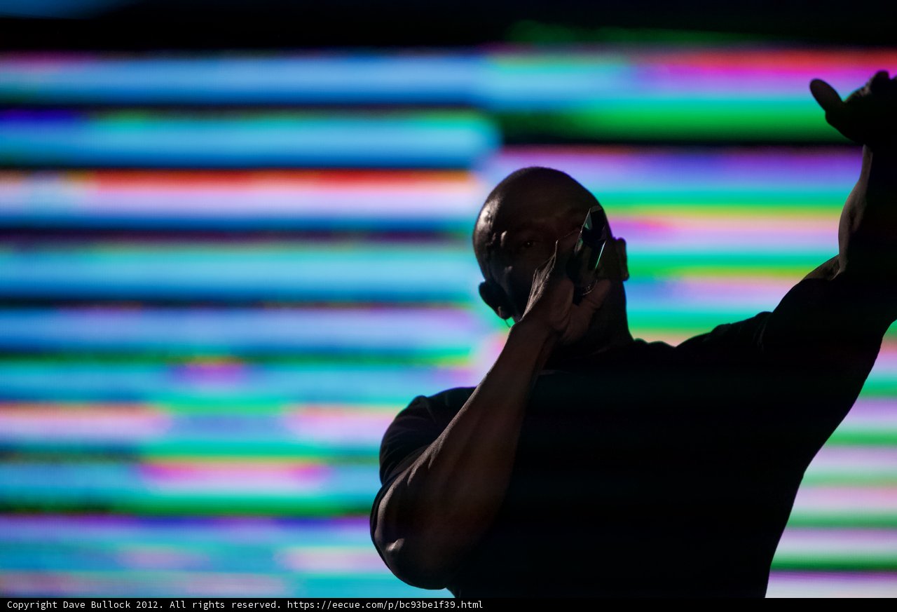 Silhouette of a Man with Hands Up