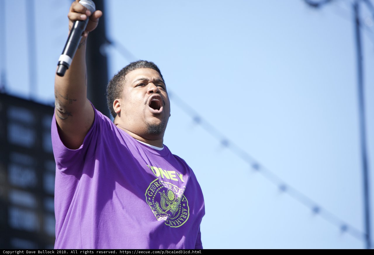 Purple Shirted Singer Serenades the Sunday Stage