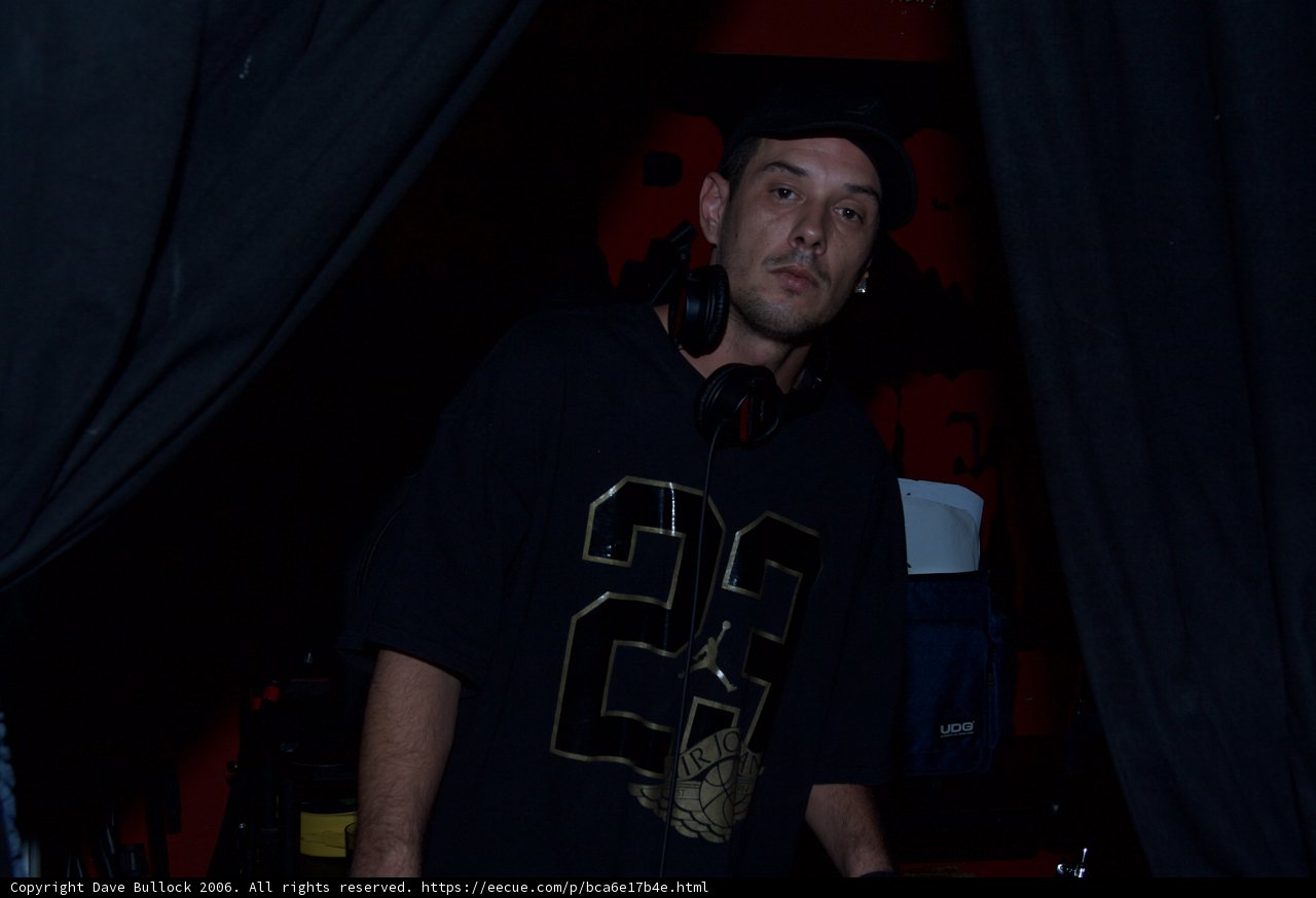 DJ S in Black Shirt and Hat