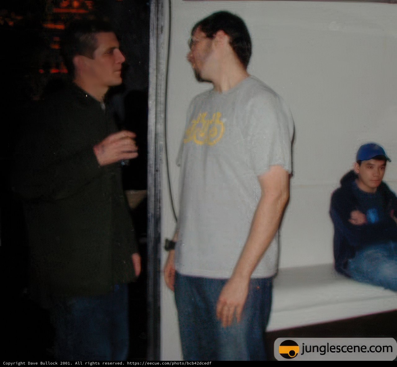 Grey Shirted Man in a Night Club