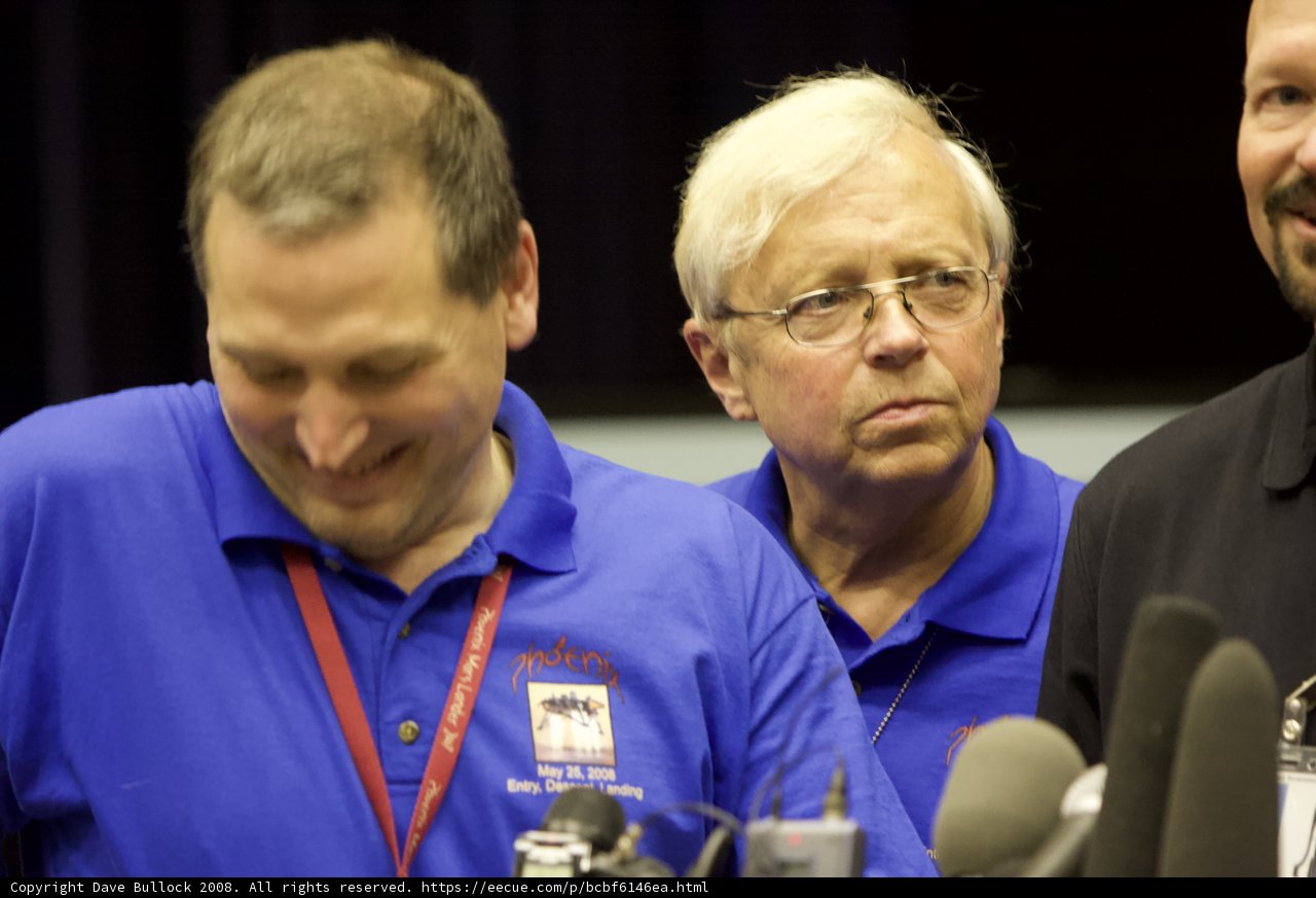 Press Conference with Blue Shirted Man