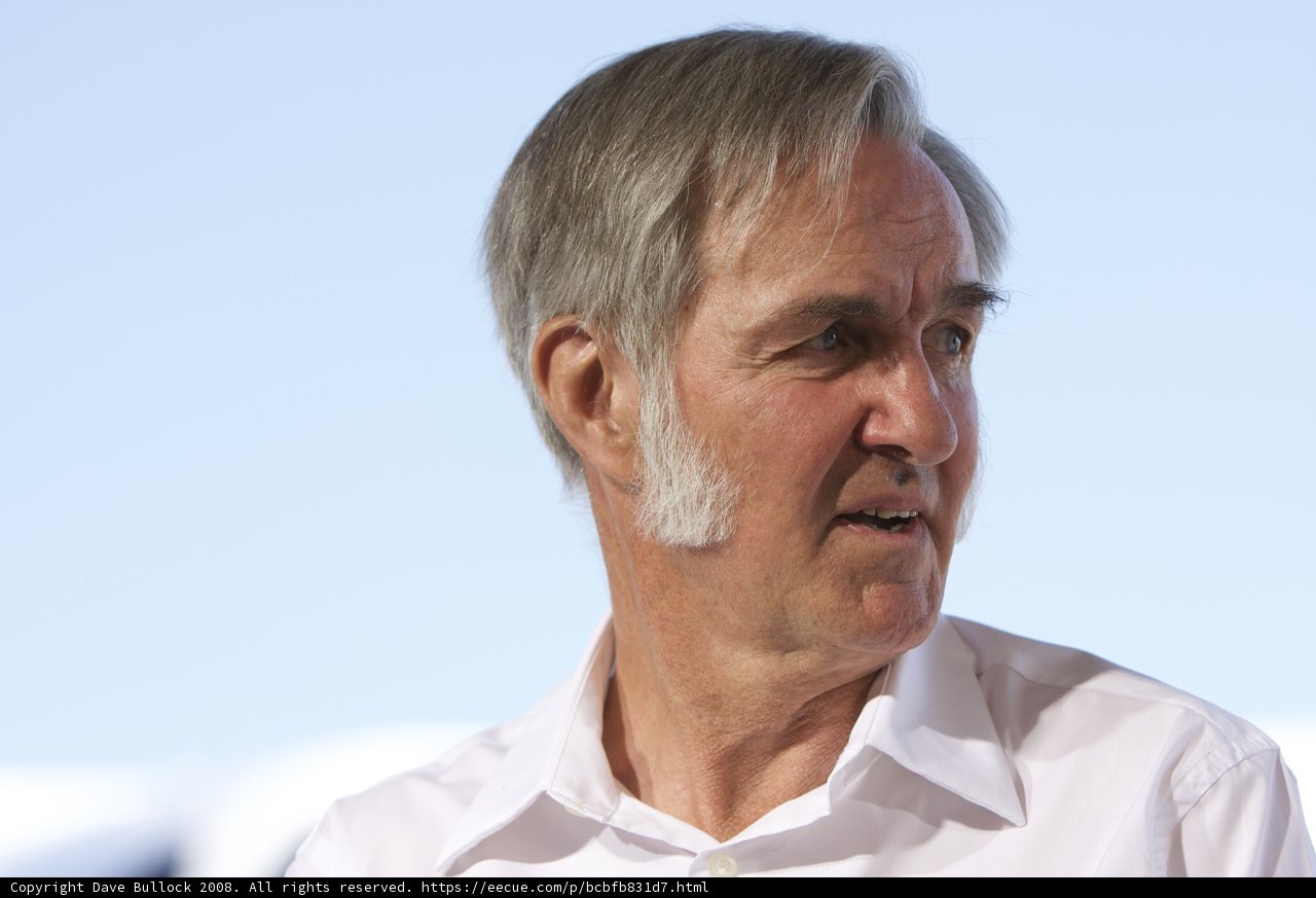 Grey-haired Man in White Shirt