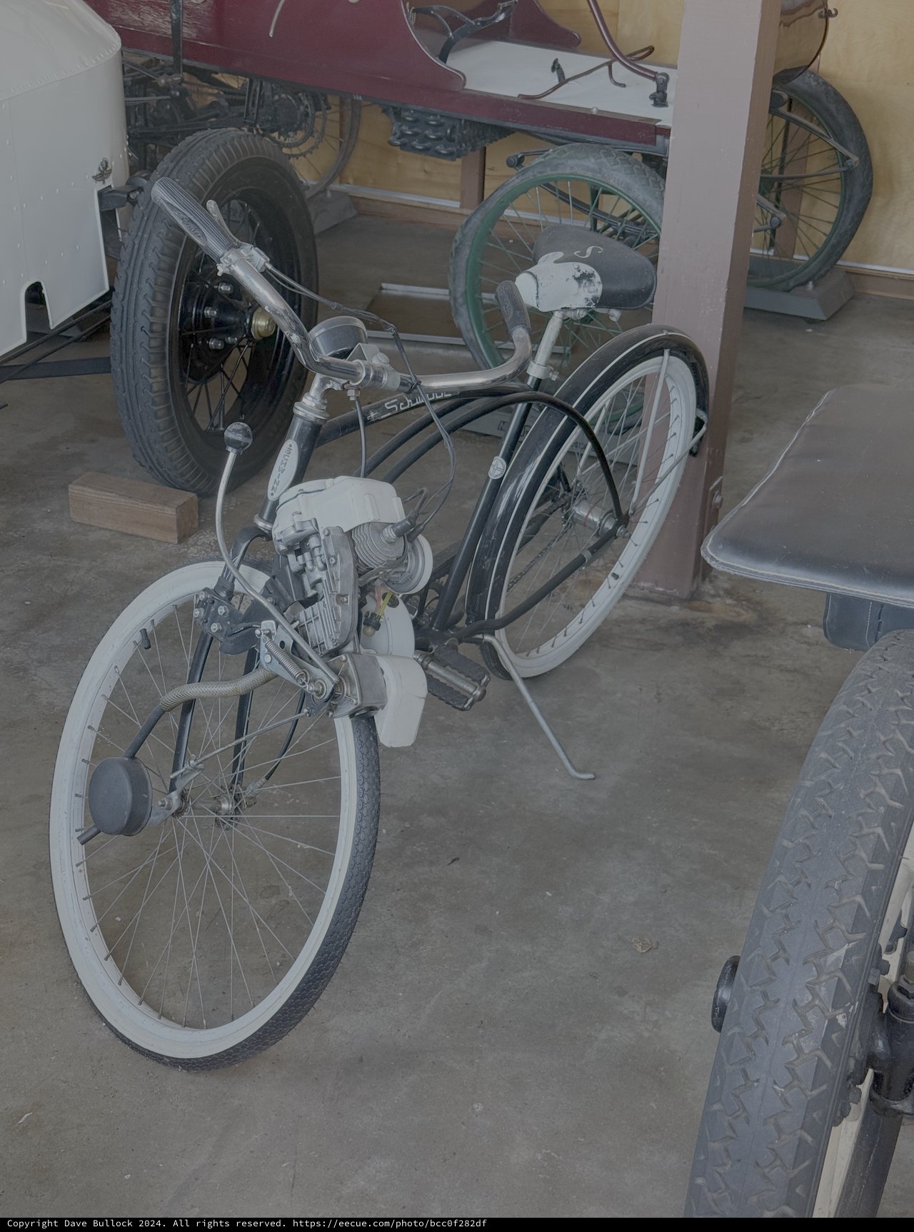 Vintage Motorized Bicycle in Museum Display