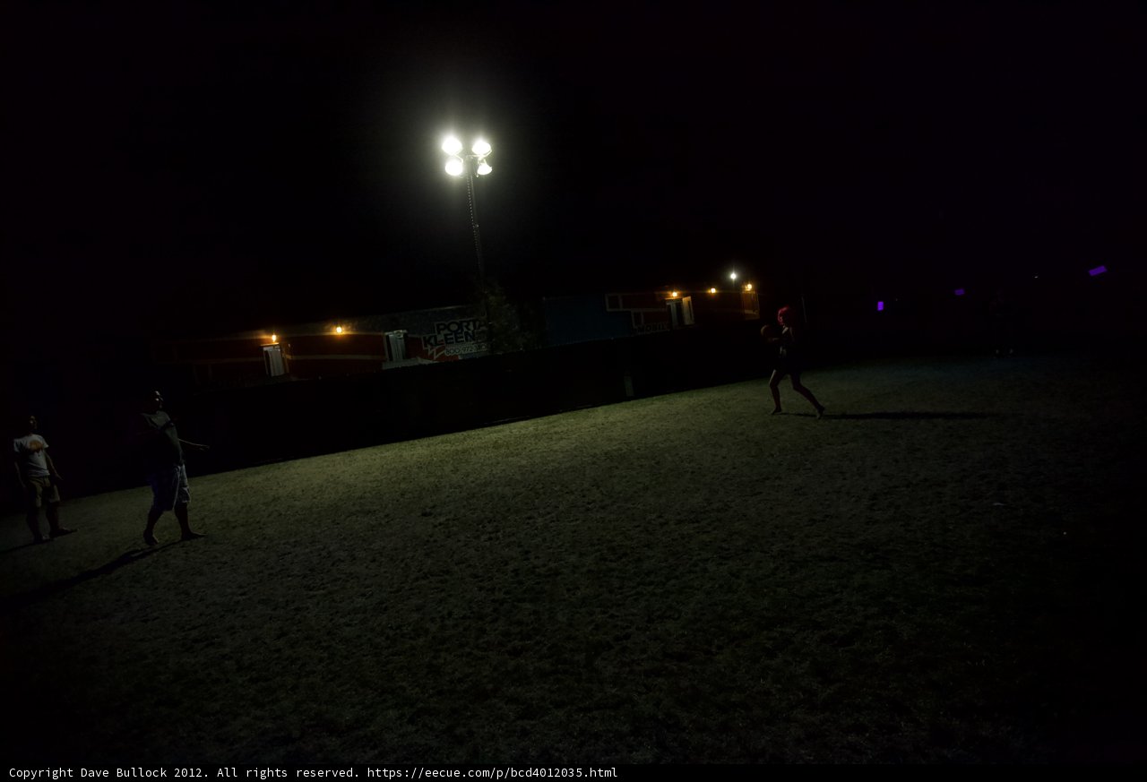 Nighttime Soccer Game Under the Moonlight