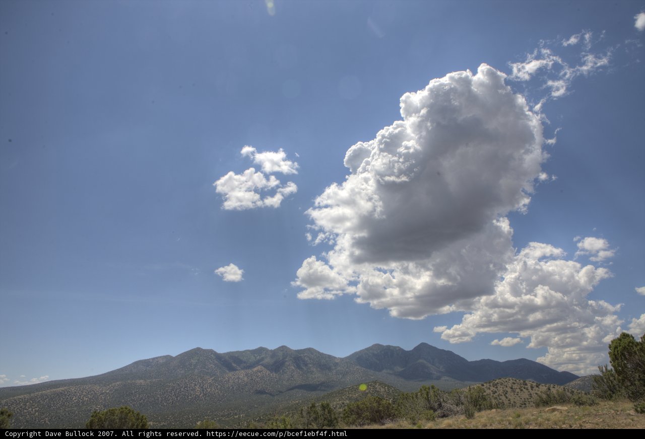 Majestic Cloud over Mountain Range