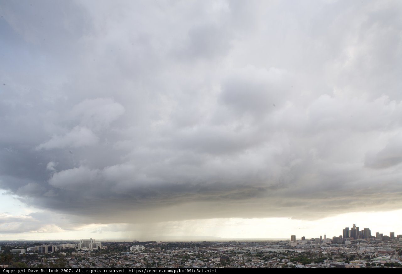 Cumulus Clouds over Urban Horizon