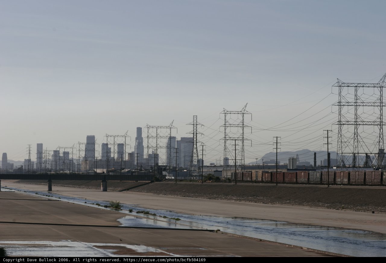 Electric Transmission Tower and Cityscape