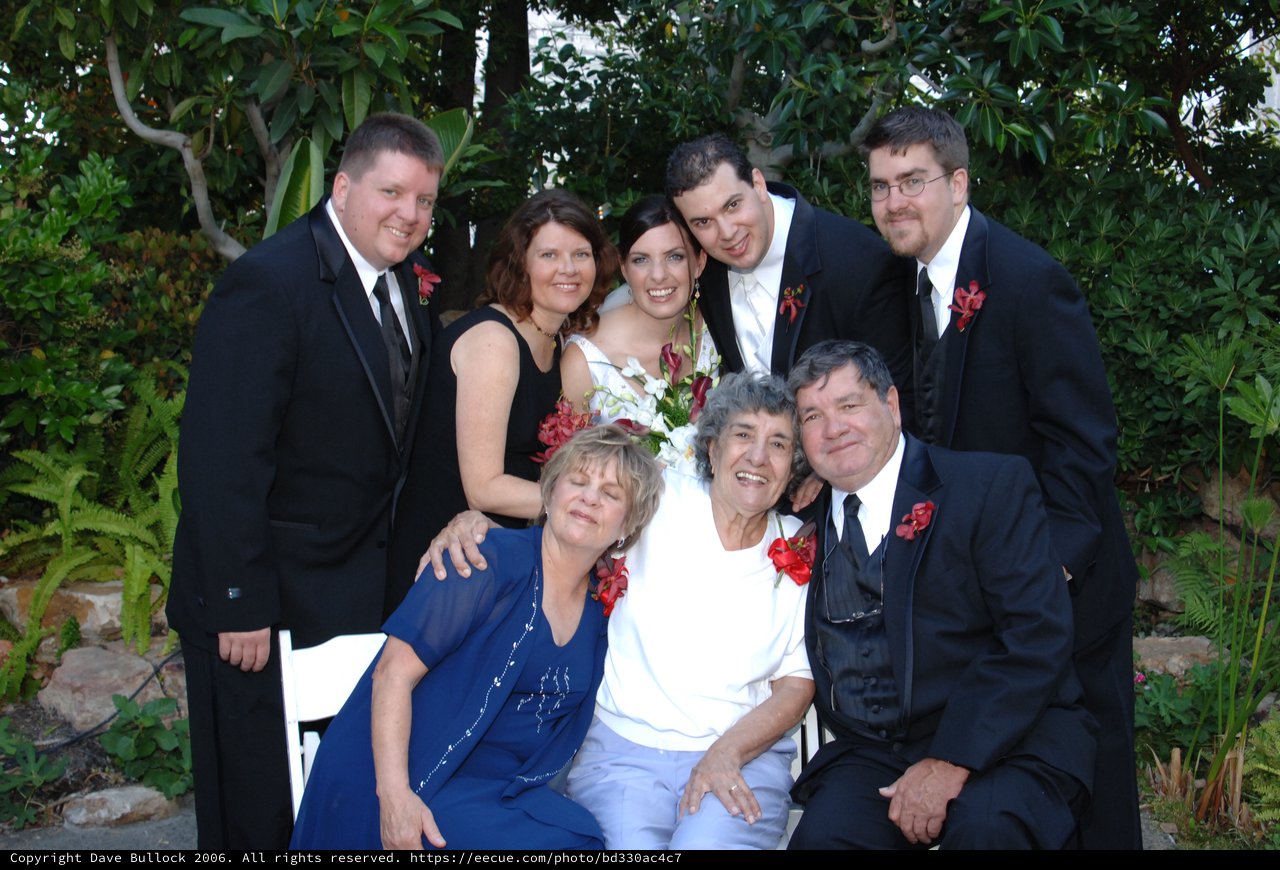 Family Wedding Portrait in Lush Garden Setting