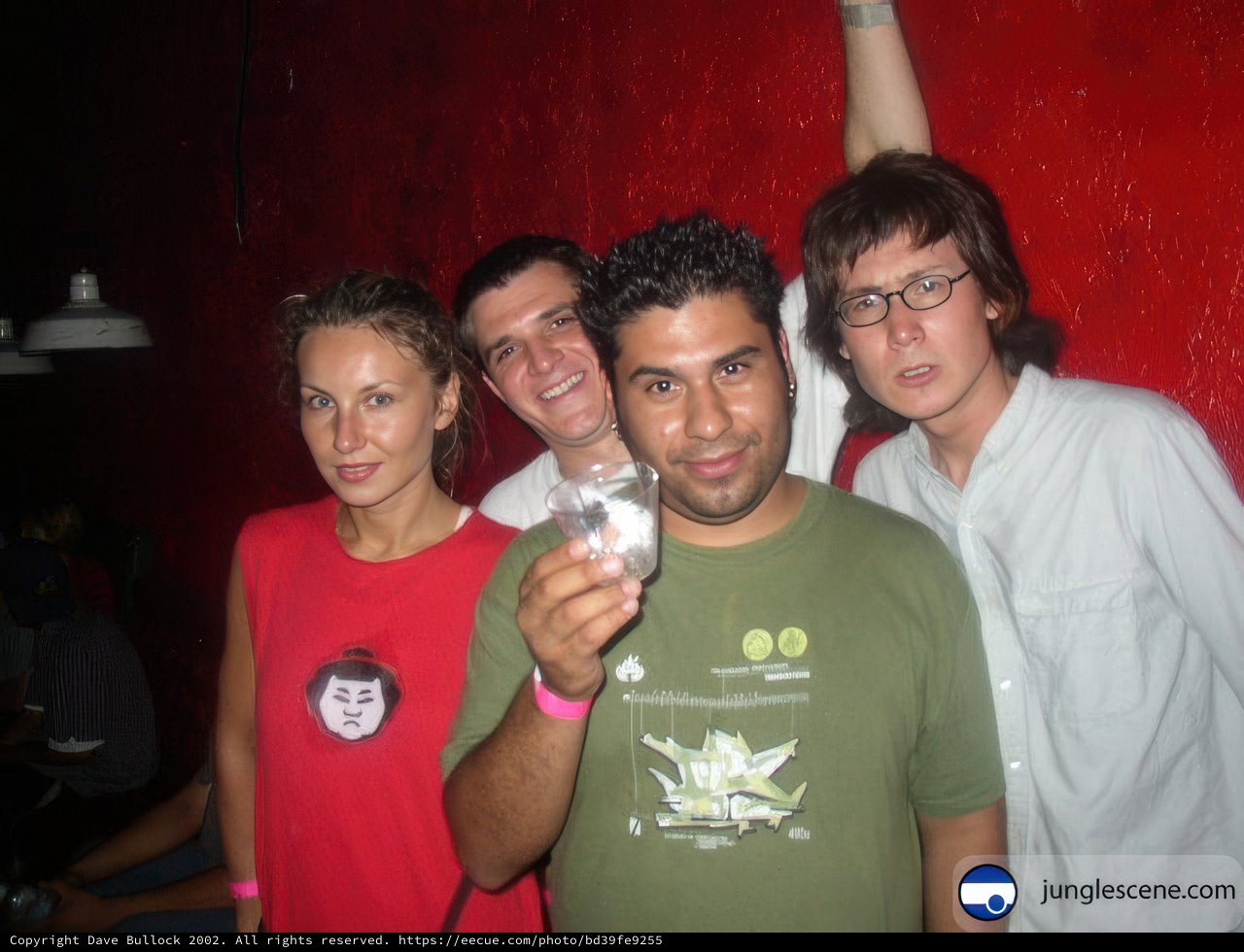 Three friends enjoy a drink together