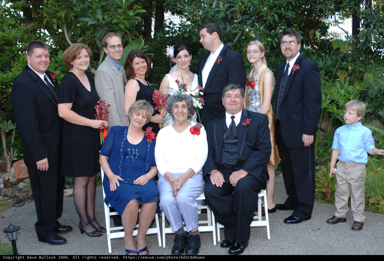 Family Wedding Portrait in Lush Garden Setting