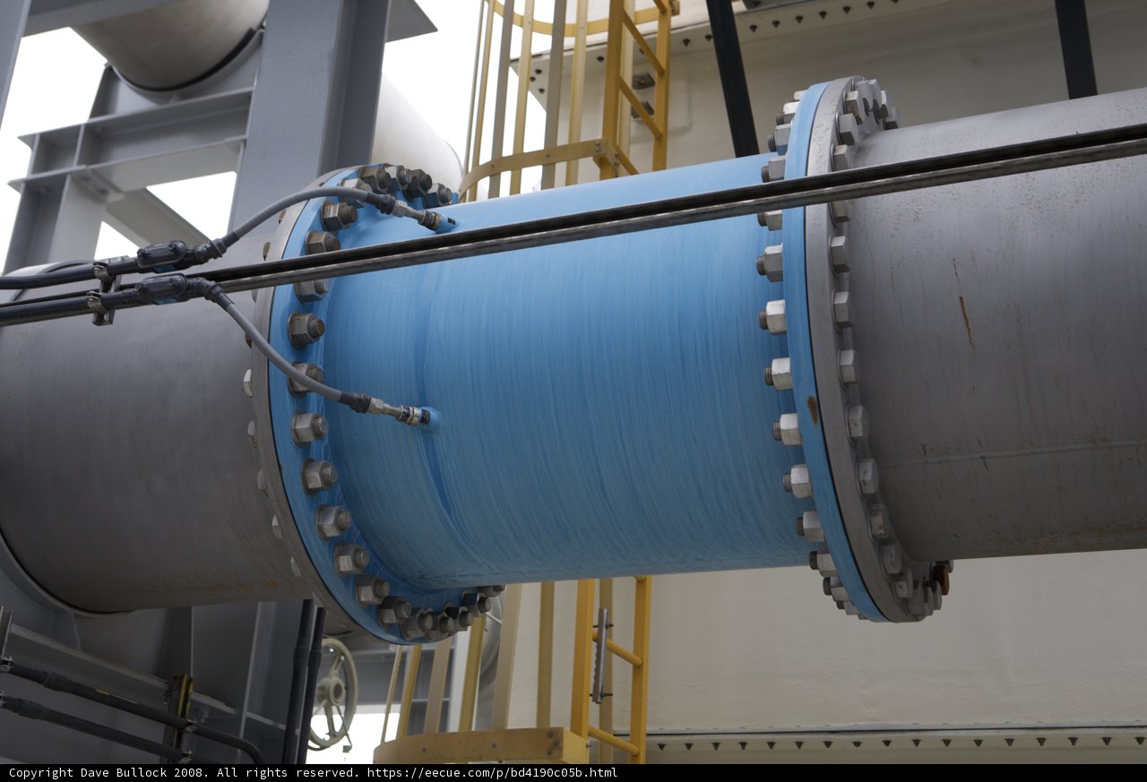The Blue and Silver Spiral of a Factory Pipe