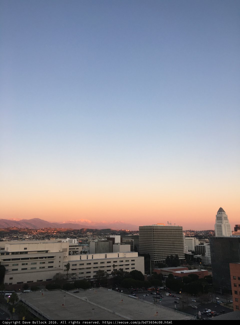 City Sunset with Mountain Backdrop