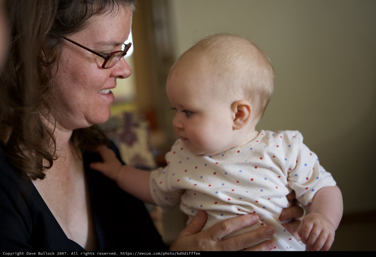 Tender Moment Between Mother and Infant Baby