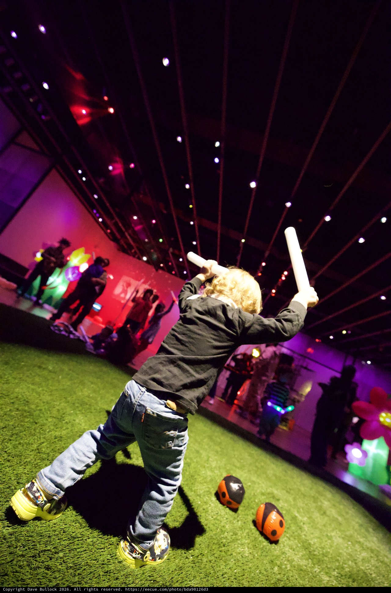 Child Playing Baseball at Baby Rave Event
