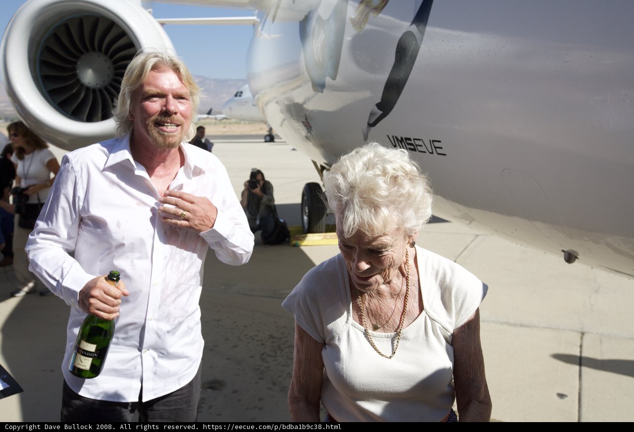 Richard Branson and companions beside their aircraft